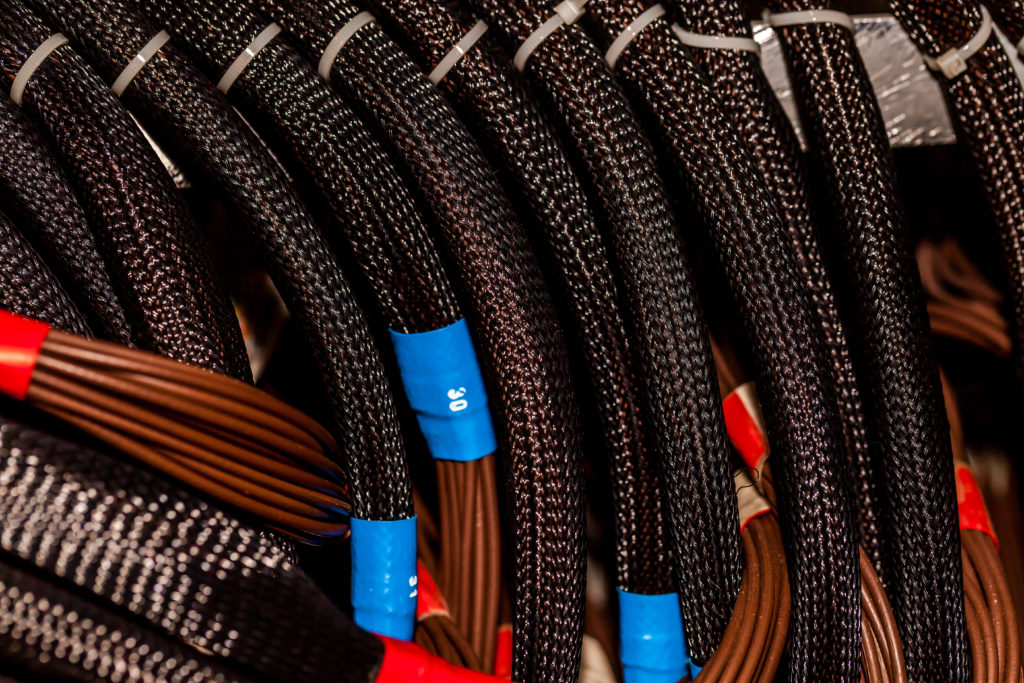 Cable assembly with the protective knit mesh cable cover shield